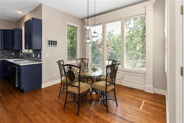 12843 Noland St, Overland Park, KS 66213 - dining room with dark wood finished floors and baseboards