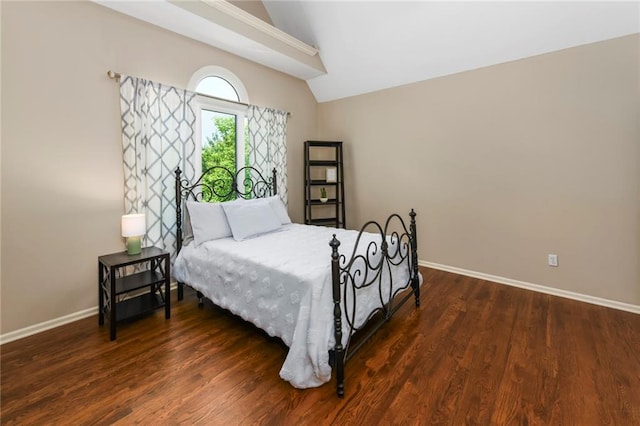 12843 Noland St, Overland Park, KS 66213 - bedroom with vaulted ceiling and dark wood-style floors