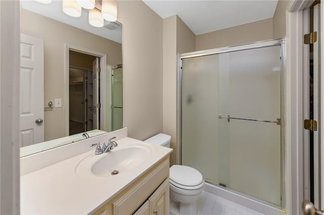 12843 Noland St, Overland Park, KS 66213 - bathroom with a stall shower, vanity, and a walk in closet