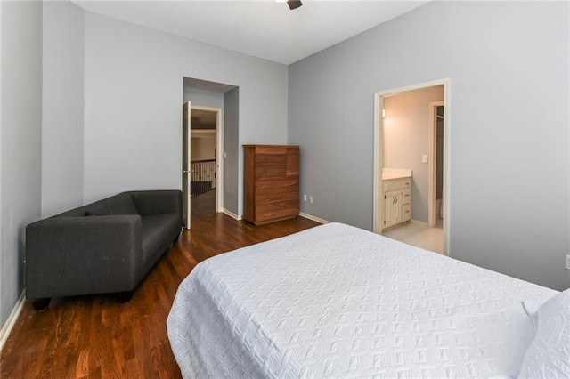 12843 Noland St, Overland Park, KS 66213 - bedroom featuring wood finished floors, ensuite bath, and a ceiling fan
