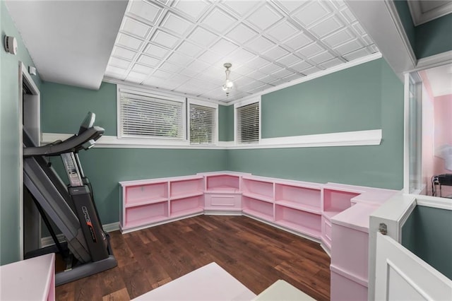 12843 Noland St, Overland Park, KS 66213 - workout room featuring dark wood finished floors, an ornate ceiling, and crown molding