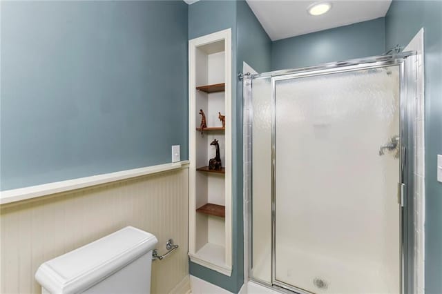 12843 Noland St, Overland Park, KS 66213 - full bathroom with a stall shower and built in shelves