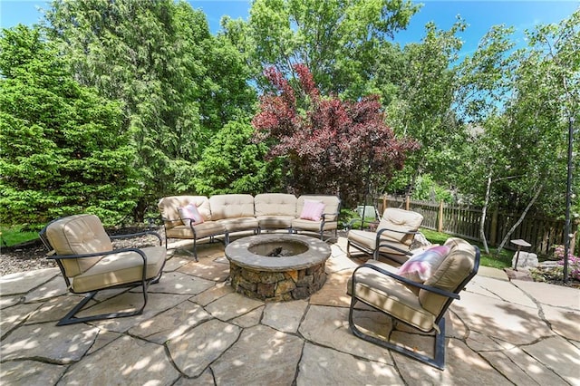 12843 Noland St, Overland Park, KS 66213 - view of patio / terrace with an outdoor living space with a fire pit