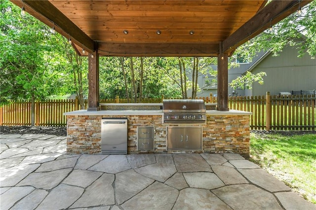 12843 Noland St, Overland Park, KS 66213 - view of patio / terrace with exterior kitchen