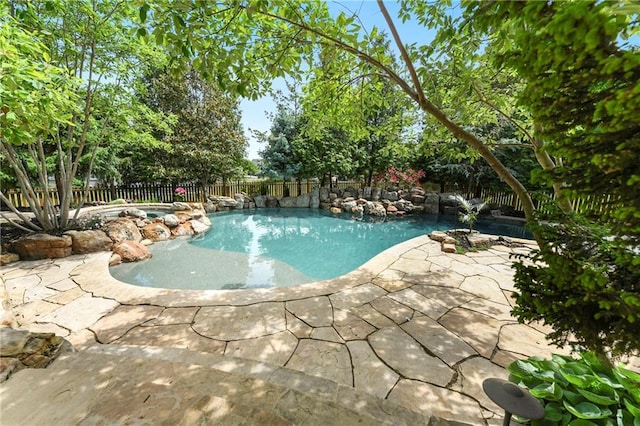 12843 Noland St, Overland Park, KS 66213 - view of pool with a fenced backyard and a patio