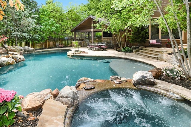 12843 Noland St, Overland Park, KS 66213 - view of swimming pool with a gazebo, an in-ground hot tub, and a patio
