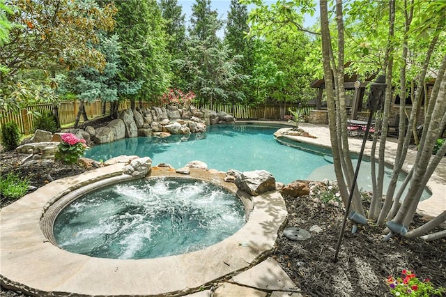 12843 Noland St, Overland Park, KS 66213 - view of pool featuring a fenced backyard, a pool with connected hot tub, and a patio area