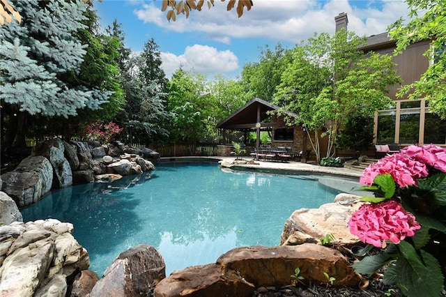 12843 Noland St, Overland Park, KS 66213 - view of pool with a gazebo and a patio