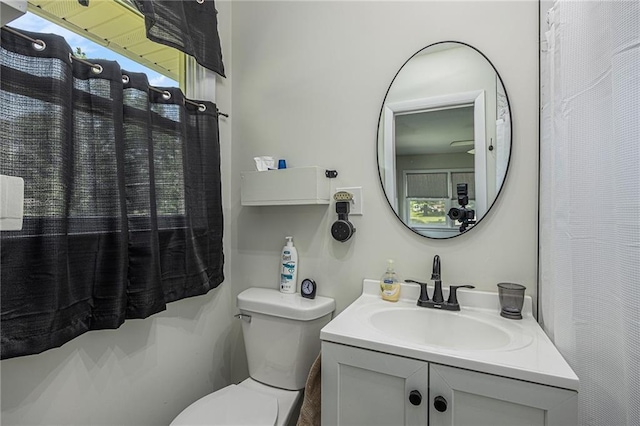 6405 Haskell Ave, Kansas City, KS 66104 - bathroom featuring toilet and vanity