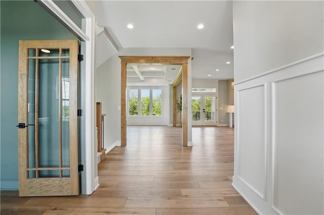 11588 S Houston St, Olathe, KS 66061 - hallway with french doors, wood finished floors, recessed lighting, baseboards, and beam ceiling