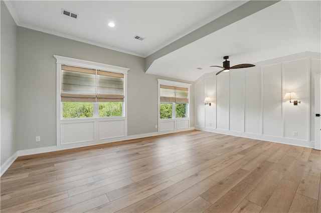 11588 S Houston St, Olathe, KS 66061 - empty room with a decorative wall, ceiling fan, light wood finished floors, and ornamental molding