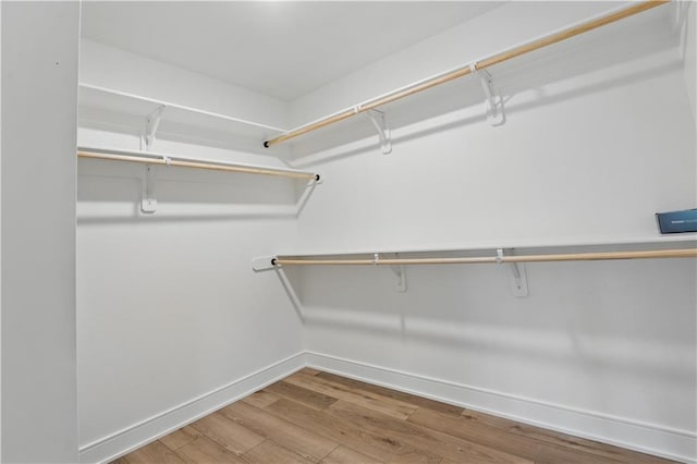 11588 S Houston St, Olathe, KS 66061 - walk in closet with wood finished floors