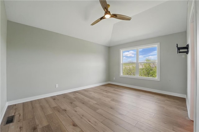 11588 S Houston St, Olathe, KS 66061 - unfurnished room with vaulted ceiling, light wood-style flooring, baseboards, and ceiling fan