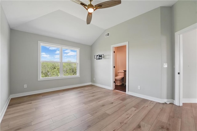 11588 S Houston St, Olathe, KS 66061 - unfurnished bedroom with lofted ceiling, light wood-style flooring, baseboards, connected bathroom, and a ceiling fan