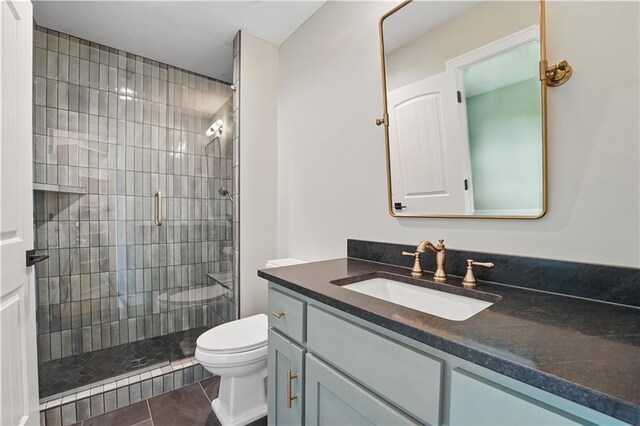 11588 S Houston St, Olathe, KS 66061 - full bath featuring toilet, a shower stall, vanity, and tile patterned flooring