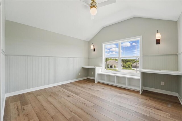 11588 S Houston St, Olathe, KS 66061 - bonus room with hardwood / wood-style flooring, vaulted ceiling, a wainscoted wall, and a ceiling fan