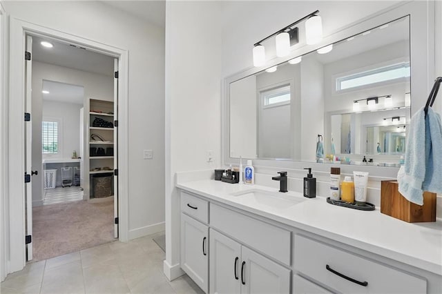 24765 W 89th Ter, Lenexa, KS 66227 - full bathroom featuring vanity, plenty of natural light, tile patterned floors, baseboards, and recessed lighting