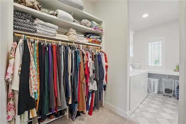 24765 W 89th Ter, Lenexa, KS 66227 - walk in closet featuring separate washer and dryer and carpet flooring