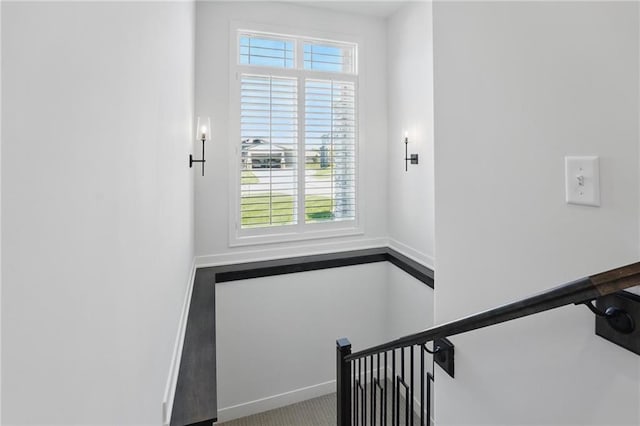 24765 W 89th Ter, Lenexa, KS 66227 - stairs featuring healthy amount of natural light, baseboards, and carpet