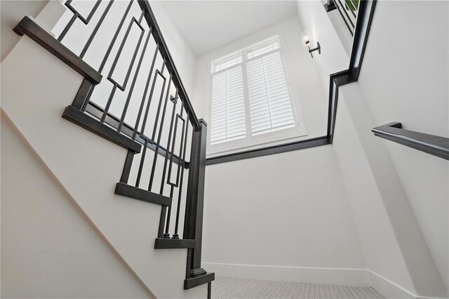 24765 W 89th Ter, Lenexa, KS 66227 - stairway featuring baseboards