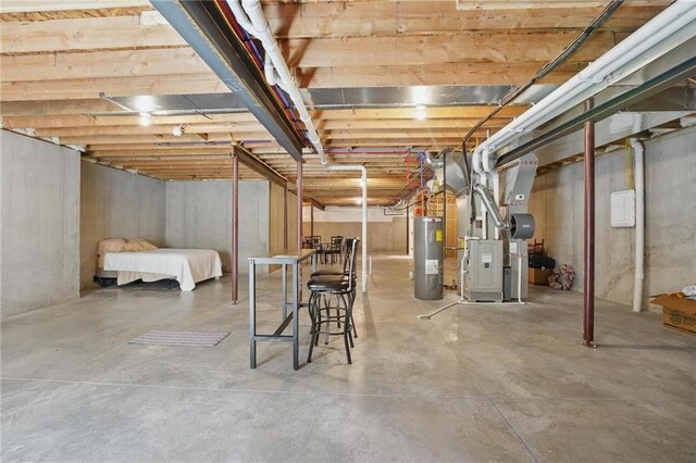 24765 W 89th Ter, Lenexa, KS 66227 - unfinished basement with electric water heater and heating unit