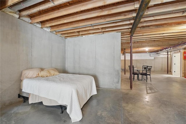24765 W 89th Ter, Lenexa, KS 66227 - bedroom featuring concrete floors