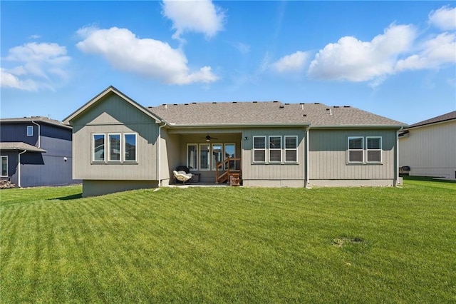 24765 W 89th Ter, Lenexa, KS 66227 - rear view of property with ceiling fan, a lawn, and a patio