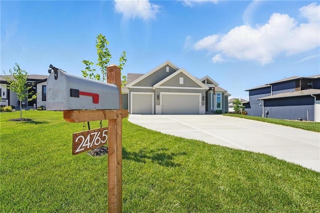 24765 W 89th Ter, Lenexa, KS 66227 - view of front facade with a garage, a front lawn, concrete driveway, and stucco siding