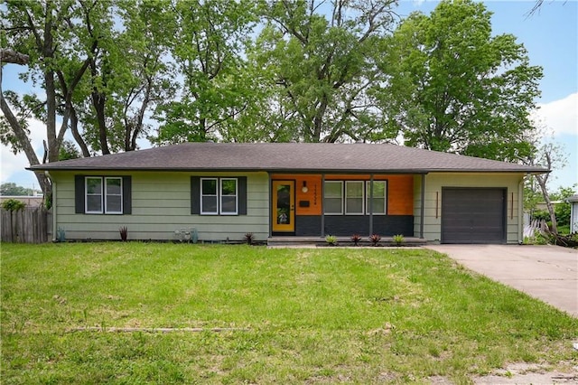 11524 Sunnyslope Dr, Kansas City, MO 64134 - view of front facade with an attached garage and concrete driveway