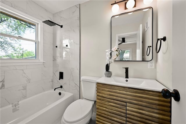 11524 Sunnyslope Dr, Kansas City, MO 64134 - bathroom featuring toilet, vanity, healthy amount of natural light, and tub / shower combination