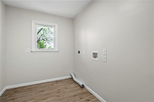 11524 Sunnyslope Dr, Kansas City, MO 64134 - laundry area with hookup for an electric dryer, baseboards, light wood-type flooring, and washer hookup