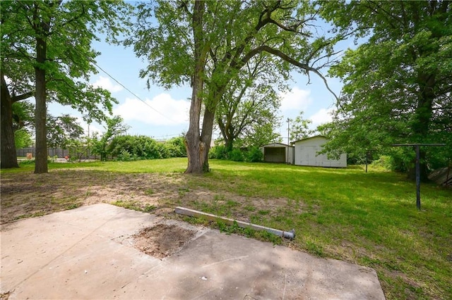11524 Sunnyslope Dr, Kansas City, MO 64134 - view of yard with an outbuilding and a patio