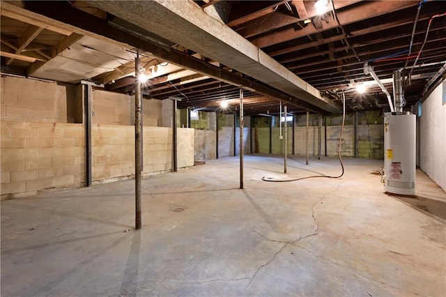 11524 Sunnyslope Dr, Kansas City, MO 64134 - unfinished basement with water heater