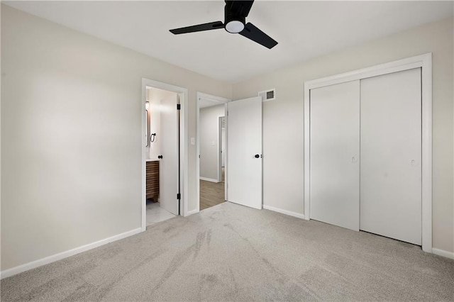 11524 Sunnyslope Dr, Kansas City, MO 64134 - unfurnished bedroom featuring carpet flooring, baseboards, a closet, connected bathroom, and ceiling fan