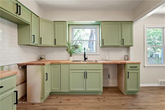 11524 Sunnyslope Dr, Kansas City, MO 64134 - kitchen with green cabinets and a sink
