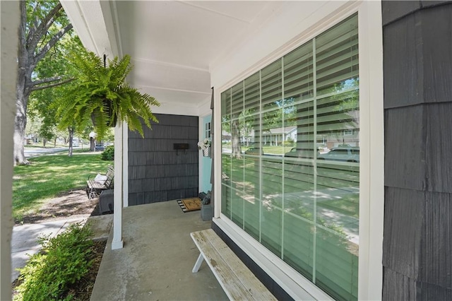 9849 Riggs St, Overland Park, KS 66212 - doorway to property featuring a porch