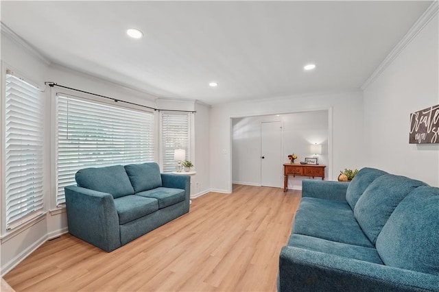 9849 Riggs St, Overland Park, KS 66212 - living area with crown molding, light wood finished floors, recessed lighting, and baseboards