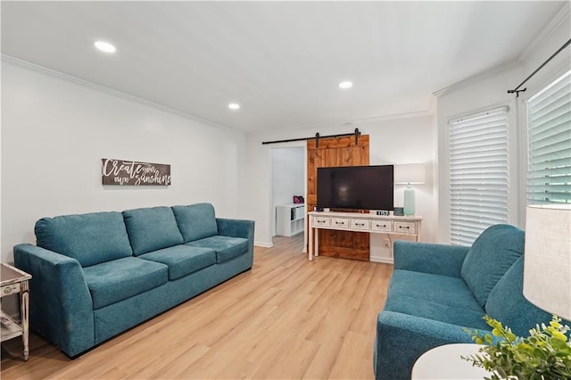 9849 Riggs St, Overland Park, KS 66212 - living room with crown molding, a barn door, light wood finished floors, and recessed lighting