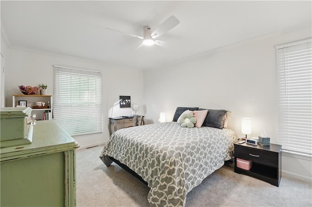 9849 Riggs St, Overland Park, KS 66212 - bedroom featuring light carpet, baseboards, ornamental molding, and ceiling fan