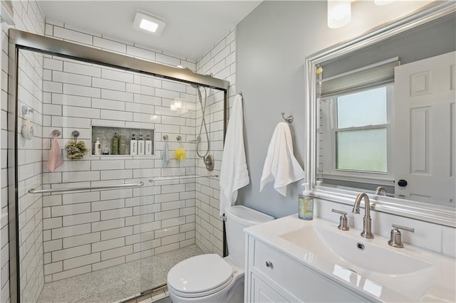 9849 Riggs St, Overland Park, KS 66212 - full bathroom featuring toilet, a shower stall, and vanity