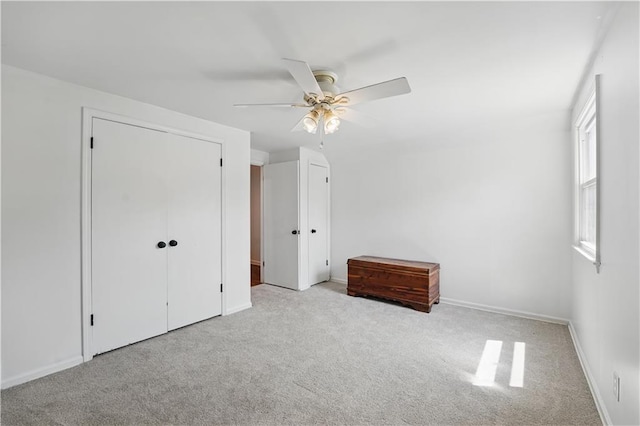 9849 Riggs St, Overland Park, KS 66212 - unfurnished bedroom with carpet floors, baseboards, and ceiling fan
