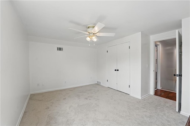 9849 Riggs St, Overland Park, KS 66212 - unfurnished bedroom featuring carpet floors, baseboards, a closet, and a ceiling fan