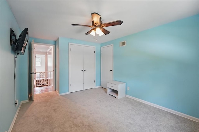 9849 Riggs St, Overland Park, KS 66212 - unfurnished bedroom featuring carpet, baseboards, a closet, and ceiling fan