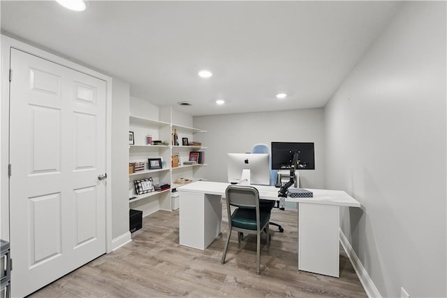 9849 Riggs St, Overland Park, KS 66212 - home office with light wood-type flooring, baseboards, and recessed lighting