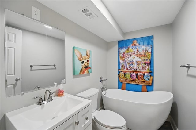 9849 Riggs St, Overland Park, KS 66212 - full bath featuring a freestanding bath, vanity, and toilet