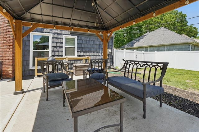 9849 Riggs St, Overland Park, KS 66212 - view of patio featuring a gazebo and outdoor dining area