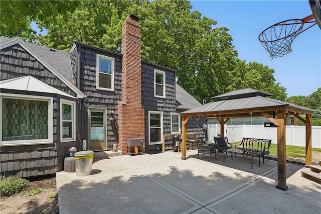 9849 Riggs St, Overland Park, KS 66212 - view of patio / terrace with a gazebo