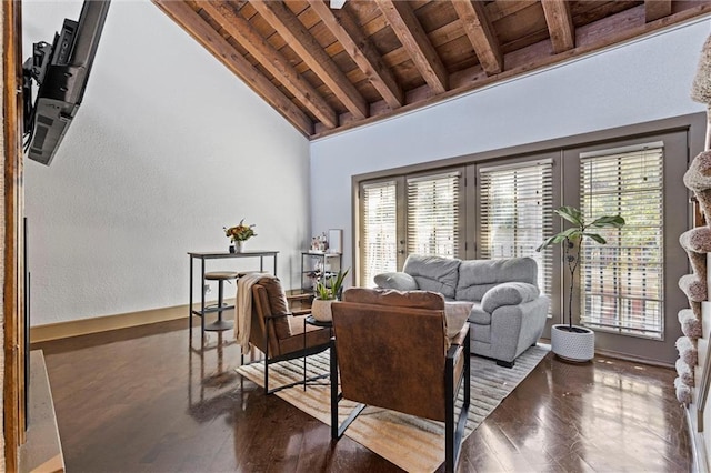 living area featuring wooden ceiling, plenty of natural light, and wood finished floors