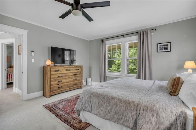 605 W 59th Ter, Kansas City, MO 64113 - carpeted bedroom with ornamental molding and ceiling fan