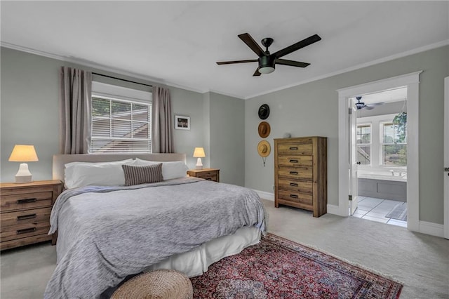 605 W 59th Ter, Kansas City, MO 64113 - bedroom featuring light colored carpet, crown molding, ensuite bath, and ceiling fan